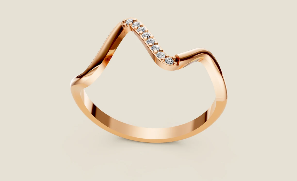 Diamond wave band in 18k rose gold with eight round diamonds set down the slope of the peak